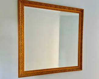 Large gold framed mirror