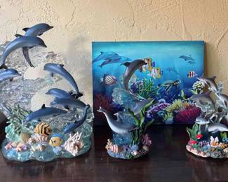 Dolphins Through The Waves