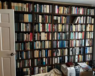 Just one part of the extensive collection of books, individual shelves are photographed at the end of the pictures for viewing