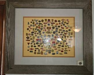 #3022 • Framed Collection of Metal Tobacco Tags

