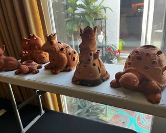 Clay pot animals. Votive holders