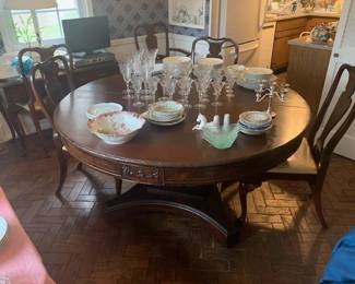 8-foot round extension table empire-style