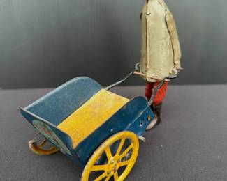 1920's Tip Top Porter with Wheel Barrel