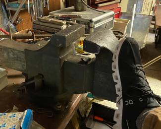 Enormous and heavy vise. Shoe for scale.