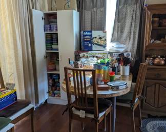 Cupboard full of plastic containers NEW and  used ,  plastic zip lock bags, aluminum foil, plastic wrap , trash bags and more !