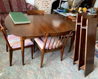 #98	Wood Oval Table w/3 leaves & 4 chairs (1 captains chair) 65-94x44x29 (as is table top finish)	 $125.00 			
