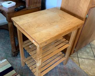 #110	Butcher Block Island w/ 2 shelves 24x18x29 (as is finish)	 $65.00 			
