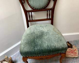 #125	Antique Green Velvet Side Chair on Wheels (as is missing piece)	 $45.00 			
