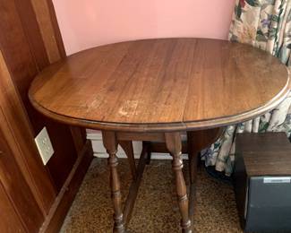 #74	Wood Drop-Side Table - 8.5-28"x21x22T  (as is finish)	 $45.00 			
