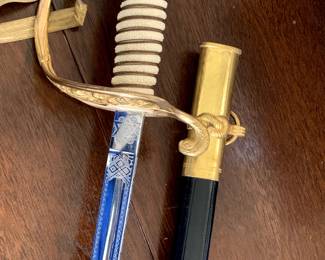 #108	Vintage USN Gecko - made in Germany Officers Dress Sword w/tassels 	 $150.00 			
