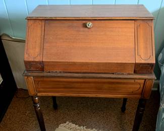#85	Wood Desk w/3 separate compartments - Base Storage 26x16x6T w/metal Tray, Good Hinges , Top has flip-front & Flip-Top - Overall 27x16x38	 $225.00 			
