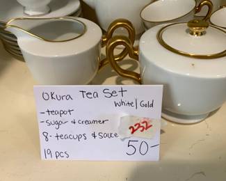 #232	Okura tea set white gold 8 piece set 	 $50.00 			
