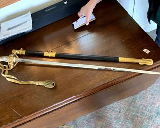 #108	Vintage USN Gecko - made in Germany Officers Dress Sword w/tassels 	 $150.00 			
