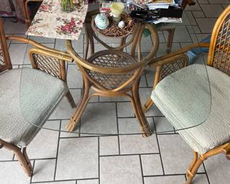 Cane glass table and 4 peacock shairs 