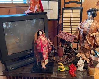 Asian dolls, chicken coop table, TV w/DVD player