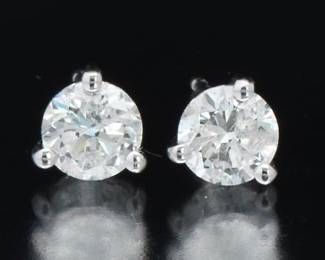 A Pair of Diamond Stud Earrings 