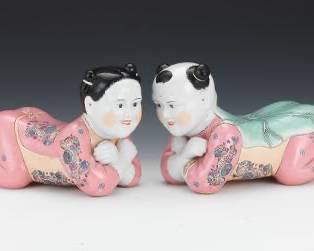 Pair of Chinese Porcelain Figural Head Pillows