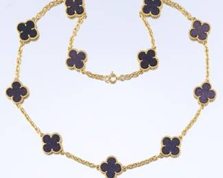Ladies Gold and Glittry Purple Stone Clover Necklace 