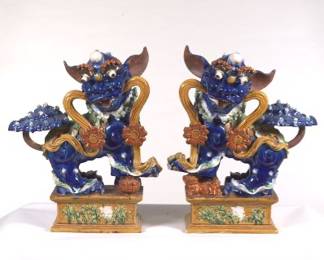 Pair of Oversized Chinese Ceramic Sancai Glazed Foo Dogs.