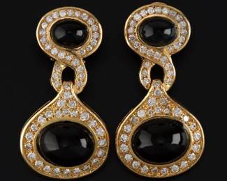 A Pair of Onyx and Diamond Earrings 