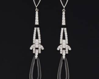 A Pair of Diamond and Onyx Pendant Earrings 