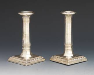 A Pair of British Sterling Silver Candle Sticks 