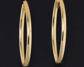 A Pair of Gold Hoop Earrings 