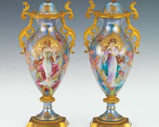 A Pair of BronzeMounted Art Nouveau Porcelain Urns by Sevres