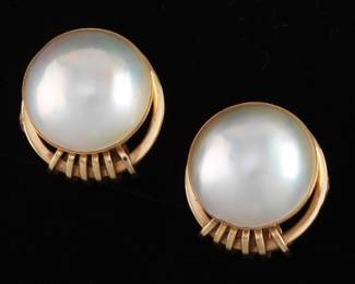 A Pair of Mabe Pearl and Gold Earrings 