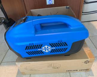Zero Breeze portable air conditioner with two battery packs. Cools 50 sq ft. The perfect gift for the dad who likes to camp in style!