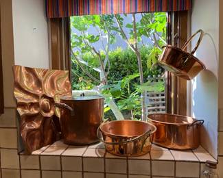 Jackson and Ellamarie Woolley Copper Wall Hanging (on the left) Vintage copper pots