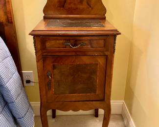 Pair of French marble top burled walnut nightstands
$600