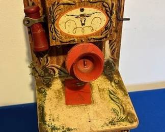 Western themed tin telephone toy