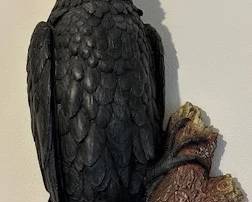 Toscano perched Raven