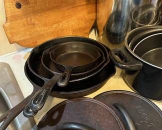 Cast iron frying pans including "Lodge"