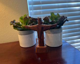 Faux Succulents 
Hand Carved Jesus on the cross