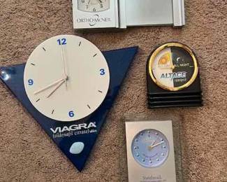 collection of advertising clocks