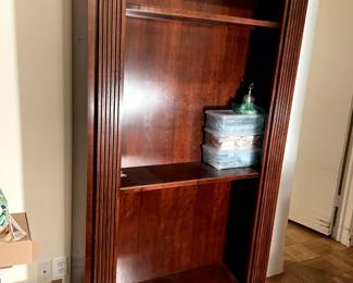 Mahogany Bookcase with glass shelf on top $250 in new condition 