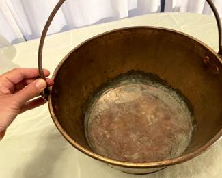 Interior view of brass bucket