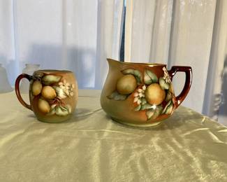  antique china pitcher & cup. $100