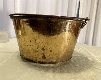 Brass bucket $50 used for kindling by fireplace