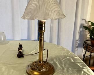 View of glass shade & brass lamp