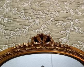 ornament on top of dressing table mirror