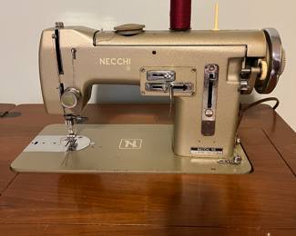 Necchi sewing machine in cabinet 