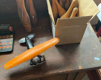 Vintage plane and bowling pin toys