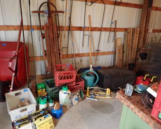 Vintage Sled. Milk Crates. Lawn Sprinklers. Plant Hangers. Wood. Tomato Cages.. 
