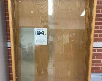 Two display cases with sliding glass doors available