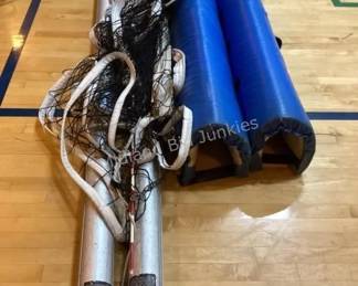 Several volleyball sets (posts, net, pole mats, etc.)