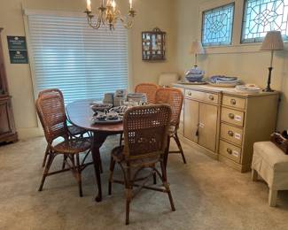 Pennsylvania House dining table, Palecek cane chairs, Painted buffet, Lamps