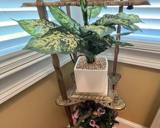 Solid Brass three shelf stand with marble top and marble finnials.  Perfect for displaying plants, pottery, knick-knacks, or simply a lamp and nothing else.  Showcase its details and beauty.